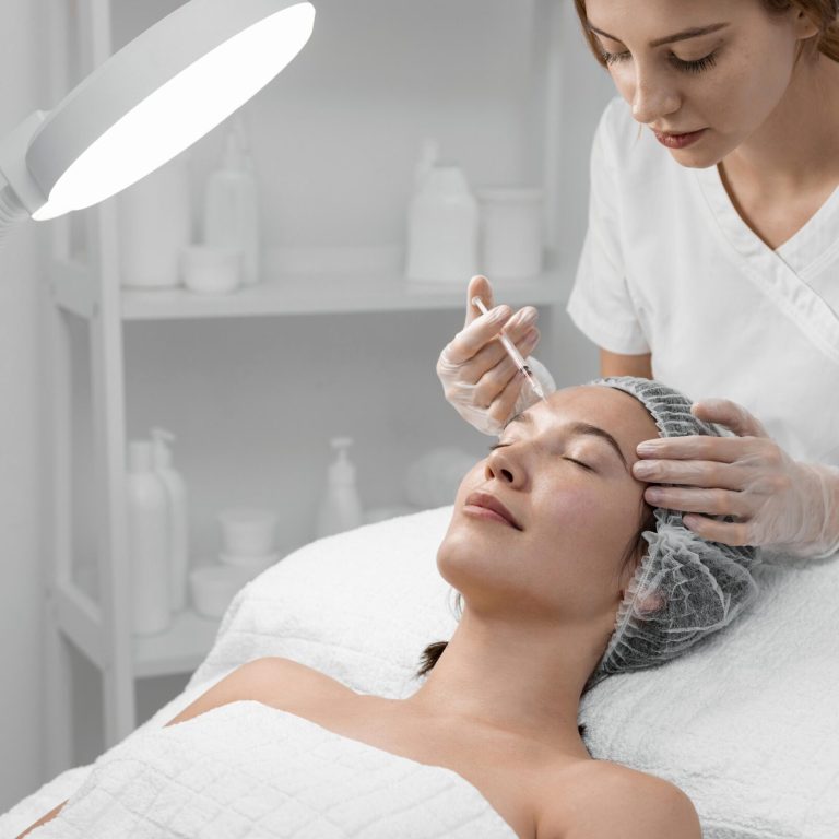 beautician-doing-filler-injection-female-client